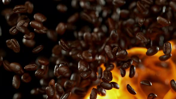 Coffee Beans and Flames After Being Exploded in Super Slow Motion.