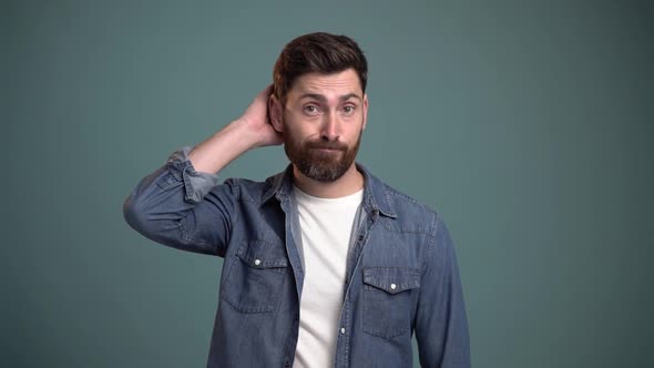 Need to think. Portrait of thoughtful brunette man with beard pondering idea, confused not sure