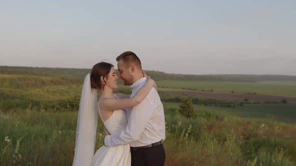 Close Up View of Bride and Groom That Hug Each Other