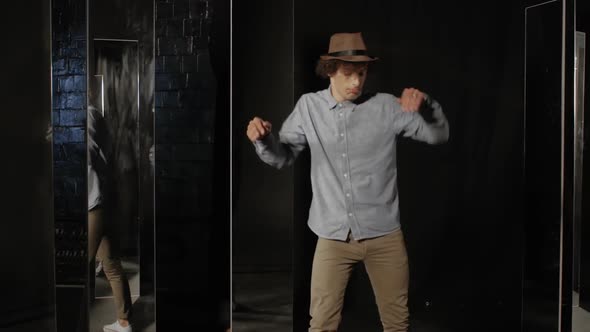 Young Man Dancing in a Hat