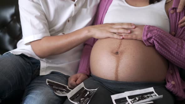 Pregnant Couple Feels Love and Relax at Home