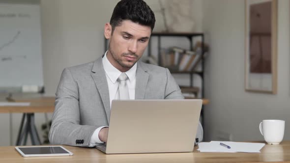 Businessman Sleeping at Work