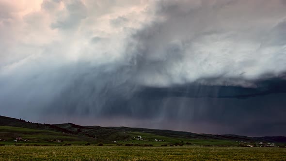 Storm clouds rolling in the sky during rain storm in time lapse