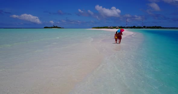 Beautiful lady and man after marriage in love enjoy luxury on beach on white sand 4K background