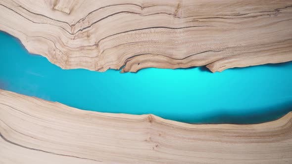 Beautiful Surface of a Wooden Slab Tabletop Filled with Epoxy Resin