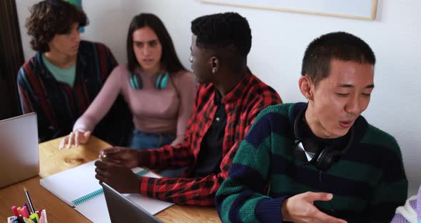 Multiracial students studying together - School concept