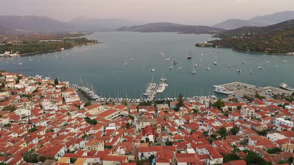 Aerial View of Poros Old Town and Marina or Seaport Greece  Drone Videography