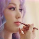Close-up On Lips Of A Young Asian Woman. Makeup Artist Apply Lipstick To Model. - VideoHive Item for Sale