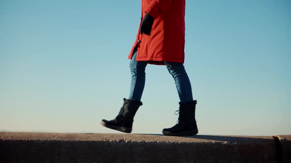 Stylish Woman Legs In Winter Boots Walking On Vacation Holiday In Cold Winter Day.