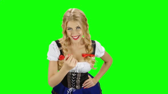 Girl in Bavarian Costume Seductive Beckoning By Finger To Herself. Green Screen