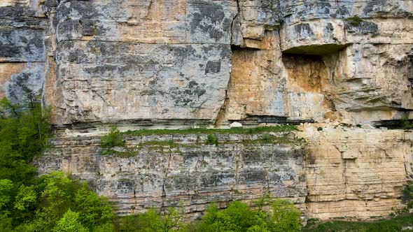 Along a sheer cliff