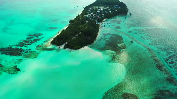 Aerial drone nature of tranquil shore beach holiday by blue sea and white sand background of a picni