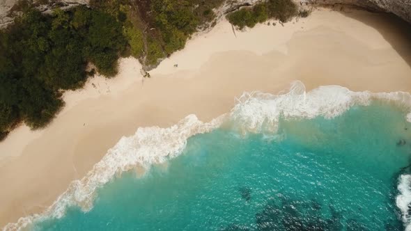 Rocky Cliff with Beach in the Sea. Karang Dawa