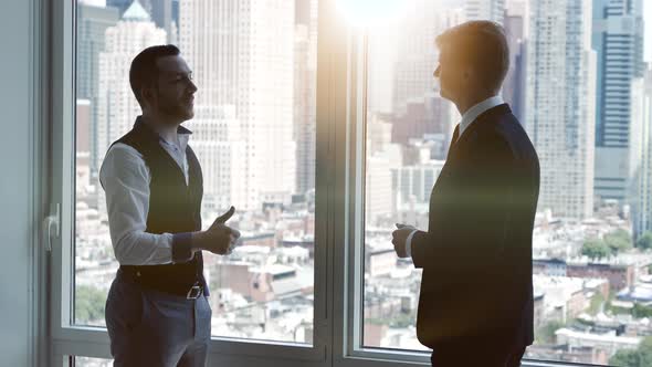 Business People having a Conversation Chatting Together