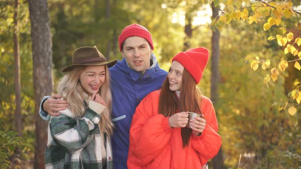 Active Young People Have Fun on Fresh Air in Forest