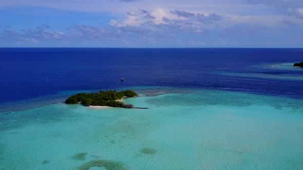 Aerial view scenery of coastline beach voyage by clear sea with sand background