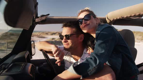 Couple in love enjoying free time on road trip together