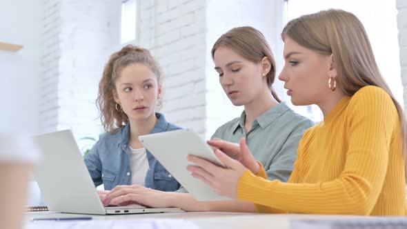 Ambitious Creative Female Designers Working on Laptop and Tablet