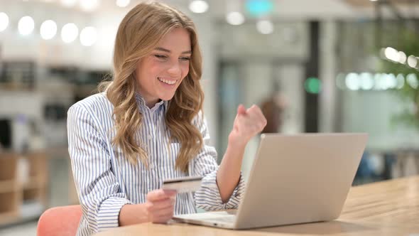 Businesswoman Having Online Payment Success on Laptop 