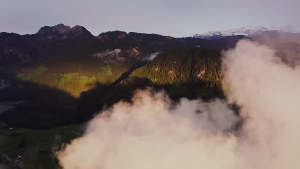 Panoramic View of a Picturesque Mountain Valley with a Village in a Lowland