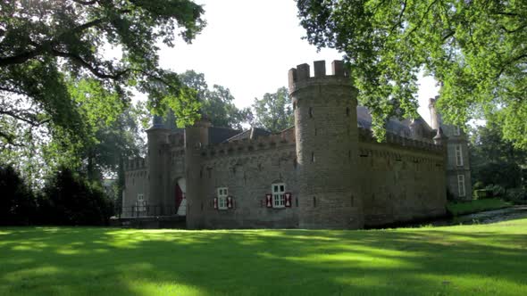 Slider shot of castle with greenfield.