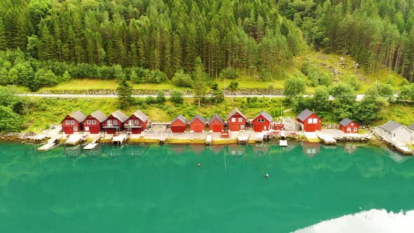 Aerial view of Fairy tale like cottages on the bank of a beautiful lake