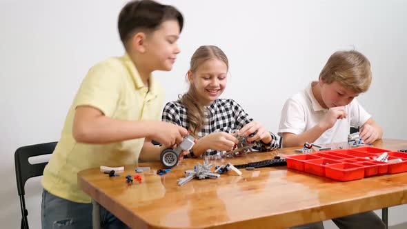 Young Friends Giving Five, Using Building Kit