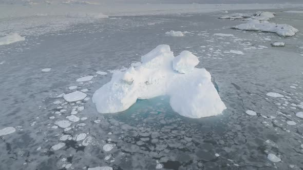 Antarctic Glacier Iceberg Aerial Zoom Out View