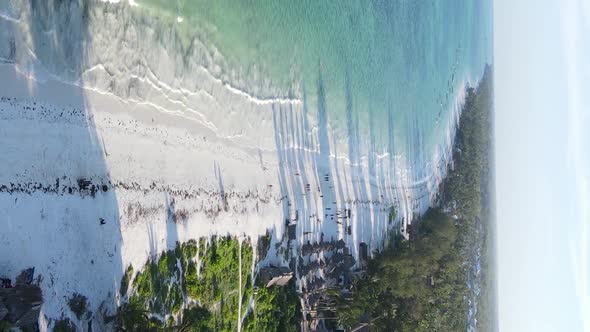 Vertical Video of the Ocean Near the Coast of Zanzibar Tanzania Aerial View