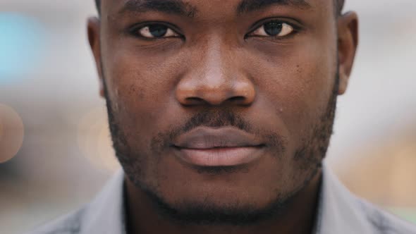 Closeup Portrait Young Confident Happy African American Male Client Raises Eyes Looking at Camera