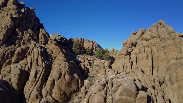 Flying Over Rock Formations