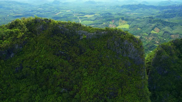 A drone is flying over "Khao Thalu"