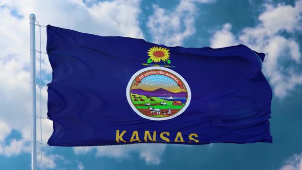 Kansas Flag on a Flagpole Waving in the Wind in the Sky