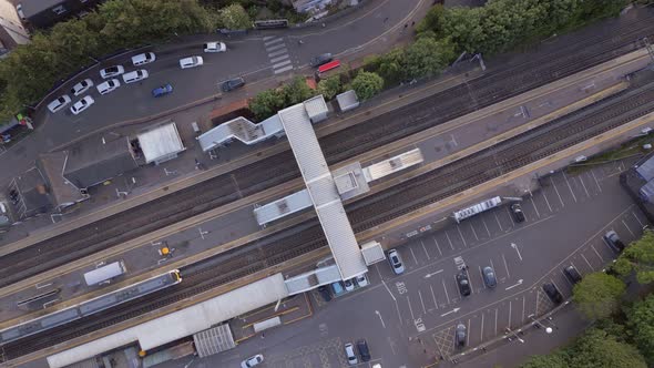 Trains Stopping at a Station in the UK Aerial View