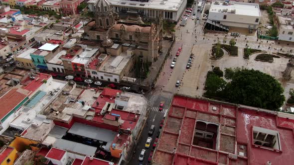 Aerial View Of Traffic Passing By Sanctuary Of Our Lady Of Guadalupe, Shrine Garden And Federal Pala