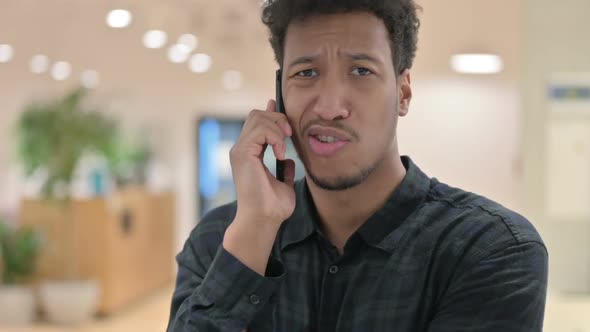 African American Man Talking on Smartphone