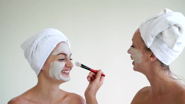 Beautiful Woman Having a Facial Treatment at Spa