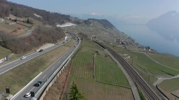 Aerial of busy highway running through Swiss countryside