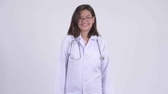 Happy Young Beautiful Asian Woman Doctor Smiling