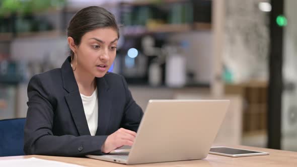 Loss Young Indian Businesswoman Reacting to Failure on Laptop in Cafe