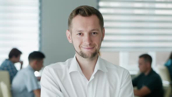 Portrait of Happy Office Worker Looking at Camera in Modern Office, Positive Male Employee with