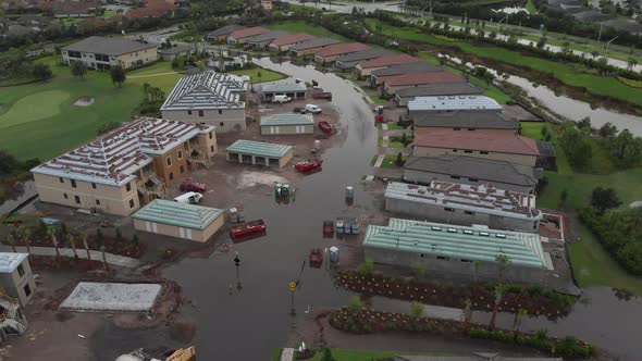 Standing water on the streets in a suburban South Florida neighborhood after a storm