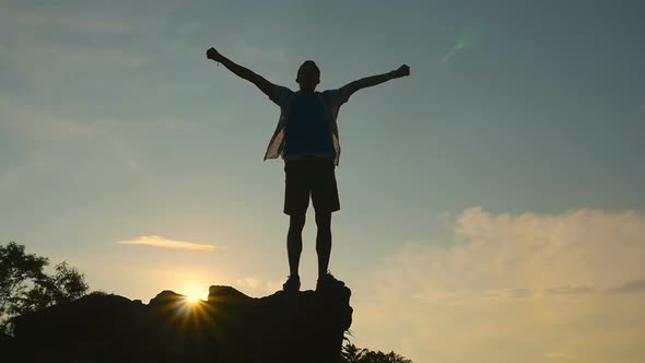 Man Cheering Elated And Blissful With Arms Raised