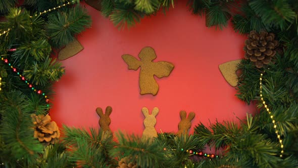 Angel, Bunnies and Heart Shape Cookies Moving on Festive Background, Christmas