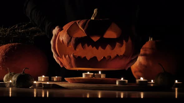 Carved Scary Halloween Pumpkin Lights Inside with Flame