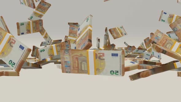 Many wads of money falling on table. 50 Euro banknotes. Stacks of money.