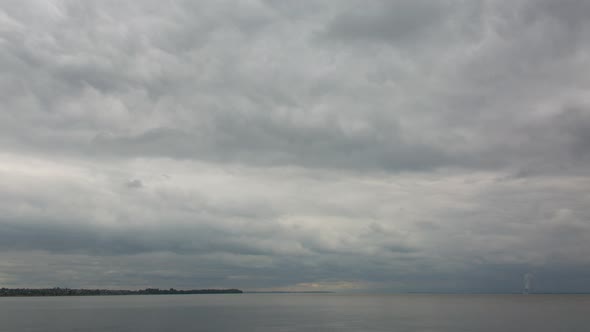 Large Rainy Clouds Over The River In Autumn, Time Lapse