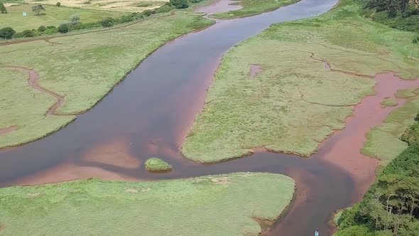 STATIC CROP, Aerial pan of River Otter by the coastal town Budleigh Salterton in Devon, UK