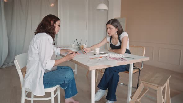 Portrait of Smiling White Caucasian Young Pregnant Woman at Drawing Class in Studio Art