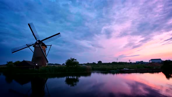Windmills at Kinderdijk in Holland on Sunset. Netherlands
